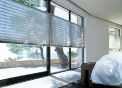 Bedroom blinds for couples who like different lighting. Honeycomb Shades